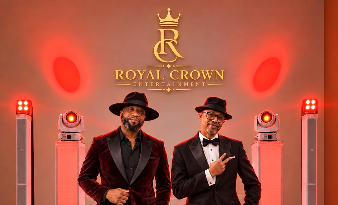 DJ Grizzly and DJ EV together in front of the Royal Crown booth