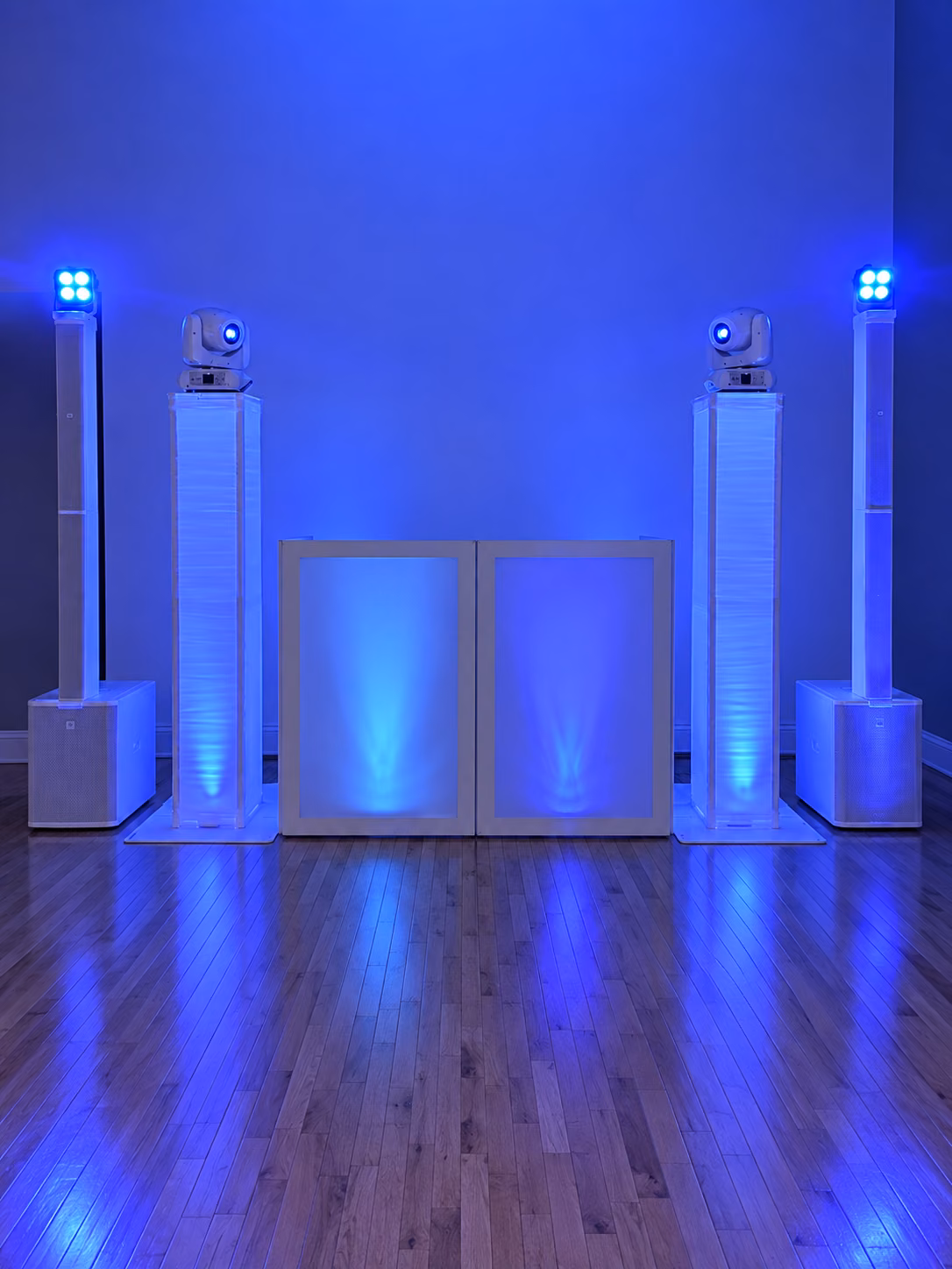The white booth and towers in blue light